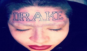 ... girl face whom had drake named tatted on her forehead on his arm. Did