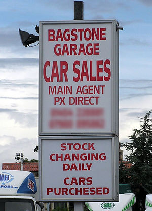 English: Misspelt sign at a garage at Bagstone...