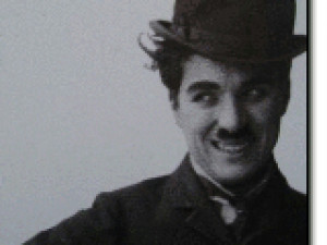 Charlie-Chaplin-Smile-keep-smiling-8935730-320-240.jpg