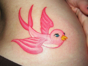 ... and flying wings this is a really pretty and girly sparrow tattoo