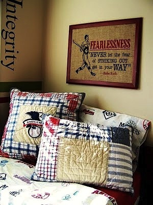 boys vintage baseball theme room with artwork and pillows