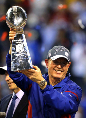 ... Tom Coughlin show him holding up the Vince Lombardi Super Bowl Trophy