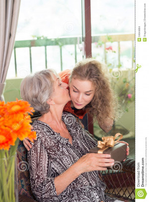 grandma-vertical-image-pretty-granddaughter-giving-kiss-to-her-granny ...