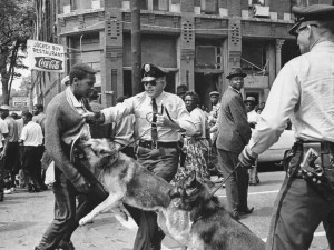 hide caption A 17-year-old Civil Rights demonstrator is attacked by a ...