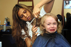 First haircut toddler girl crying