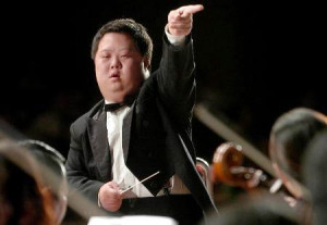 Down Syndrome boy Zhou Zhou is also a famous talented conductor.