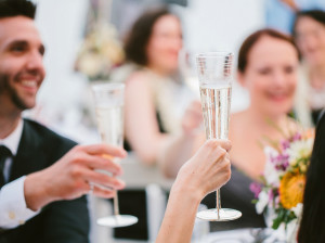 Champagne wedding toast at outdoor Hawaii reception
