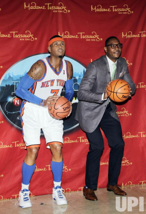 New York Knicks star Carmelo Anthony poses next to his Wax Figure when ...