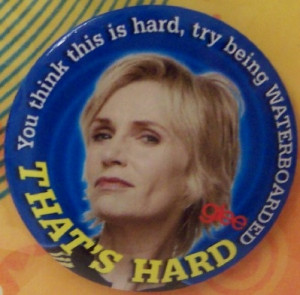 sue sylvester buttons each with a sue photo and quote