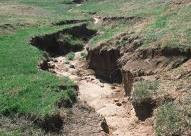 by water washing away soil stopping soil erosion is not