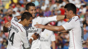 Real Madrid's Cristiano Ronaldo, center, Chicharito, left, and James ...