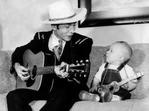 Hank Williams in happy times with the infant son, Hank Williams Jr