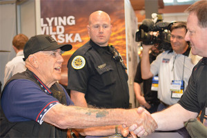 Gunny Time” TV show host R. Lee Ermey greets a fellow NRA member at ...