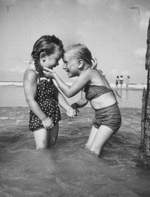 Lisa Larsen, Little girls playing together on a beach, Atlantic Beach ...