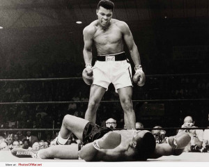 Muhammad Ali stands over Sonny Liston - 1965
