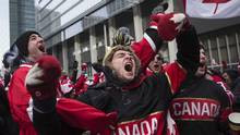 Hockey fans celebrate in Toronto’s Maple Leaf Square during Canada ...