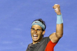 Rafael Nadal of Spain celebrates defeating Roger Federer of ...