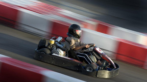 Go-kart racing on a track, side view (©Transtock / SuperStock ...
