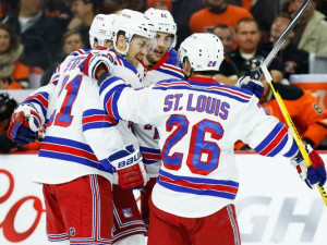 New York Rangers right wing Martin St. Louis (26) and center Derek ...