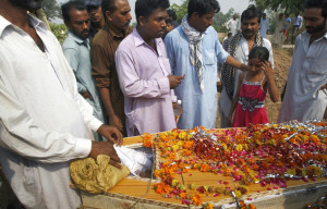Family members in the funeral of one of those killed in the bombing of