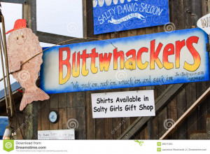 Editorial Stock Image: Alaska - Homer Spit Funny Fishing Charter Sign