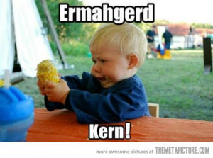 Funny photos funny baby eating corn