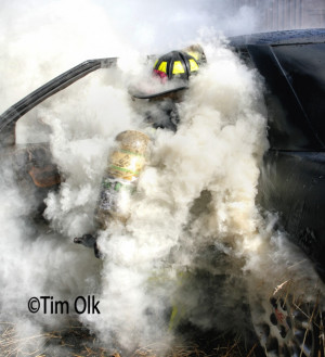 The firefighter encounters heavy smoke from the passenger compartment ...