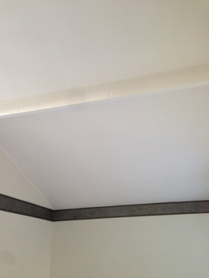 ... paint with Swiss Coffee 23, flat paint. Filled gap at beam and ceiling