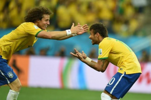 Neymar (right) celebrates with his teammate defender David Luiz after ...