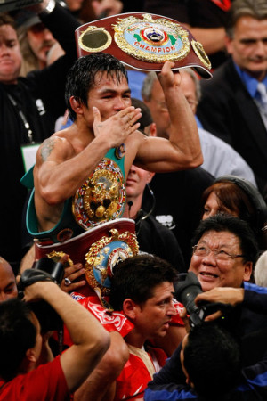 Manny Pacquiao Manny Pacquiao celebrates his 12 round TKO victory
