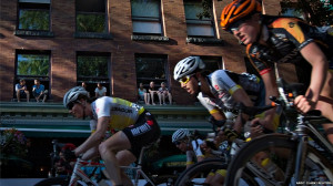 Spectators watch from windows during the women's race of the 40th ...