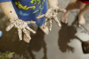 Boy with Muddy Hands - Nicki Pardo/ The Image Bank/ Getty Images