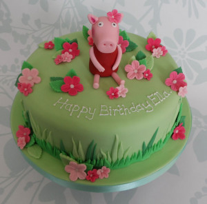 This Peppa Pig birthday cake is cute and simple, with Peppa sitting in ...