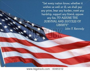 Close-up of American Flag with Pres. Kennedy's quote - 