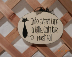 Cat signs handpainted with clever s ayings, ...