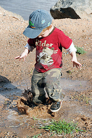Little Boy Playing Mud