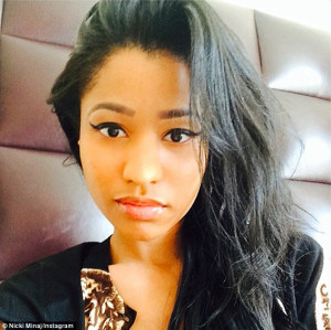 Not quite make-up free: Nicki Minaj came out from behind her usual ...