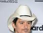 Brad Paisley poses in the press room during the 2014 Billboard Music ...