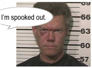 911 caller reports finding naked Randy Travis lying on the road. At ...