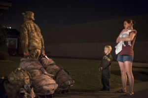 Tech. Sgt. Aaron Drain walks away after saying goodbye to his family ...