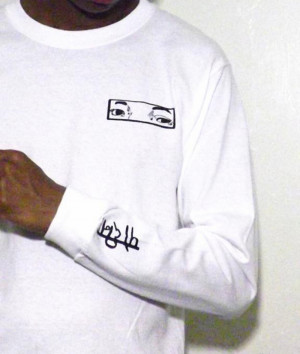 Trials & Triumph-----Writing on the black/white long sleeves say ...