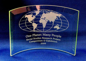 world map engraved on beveled bent glass plaque personalized