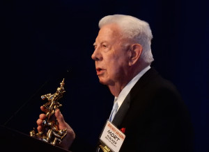 Mort Walker announces the winner of the Reuben Award
