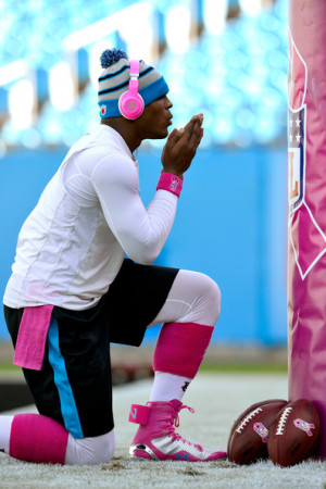 Cam Newton Cam Newton #1 of the Carolina Panthers kneels in front of ...