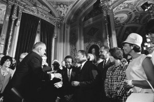 Lyndon Johnson and Martin Luther King Jr after the signing of the ...