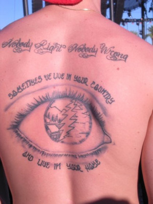 Huge eyeball on back tattoo quote tattoo bad tattoos terrible awful ...