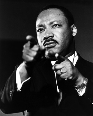 Martin Luther King Jr., is pictured above and below wearing his ...