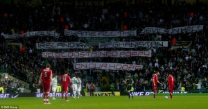 Fury at fans: Celtic supporters with their banners of protest at the ...