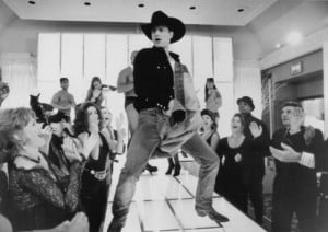 ... of Woody Harrelson and Marg Helgenberger in The Cowboy Way (1994