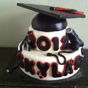 Very cool graduation cake for a hairstylist graduate